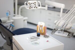 dental expert witness - dentist office with tooth model