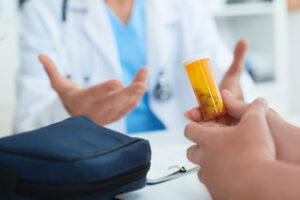 pharmacist prescribes pills